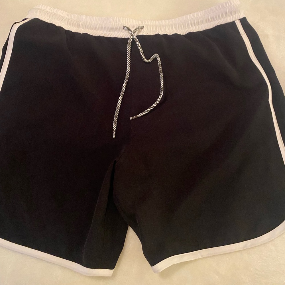 Black men’s lainsnow swim trunks
